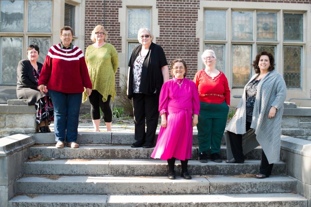 volunteers standing outside of Women’s Literacy Program in Durham