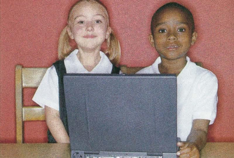 kids sitting at laptop