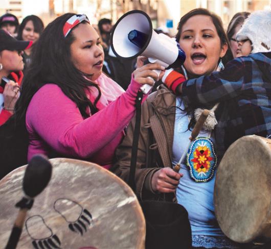 Indigenous activists organizing outside