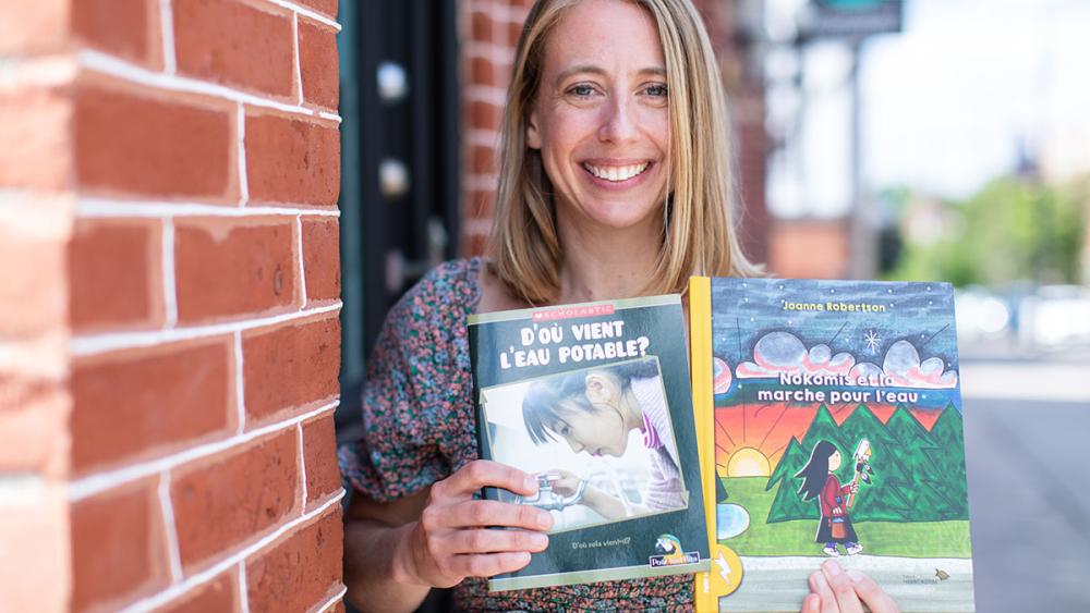 Christina Heyding posing with books