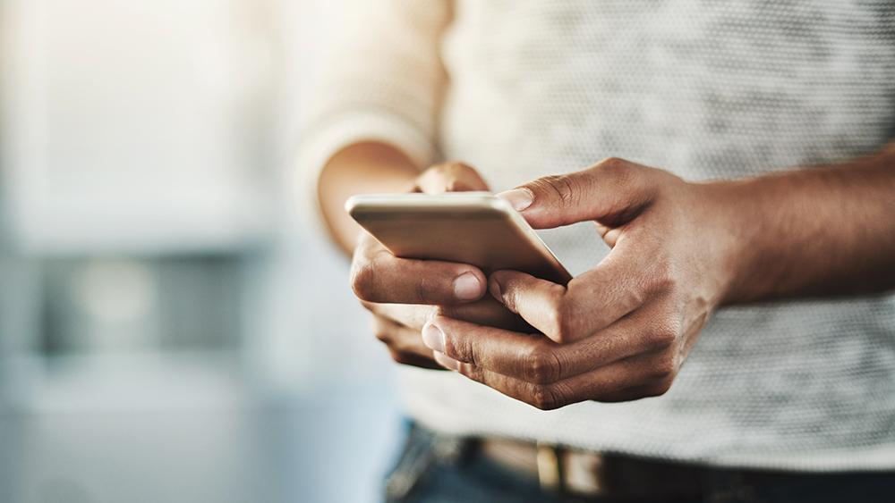 Stock image of person using a cellphone