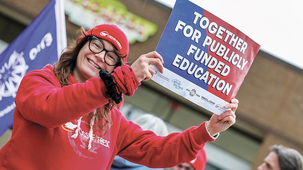 ETFO Member holding sign at Day of Action