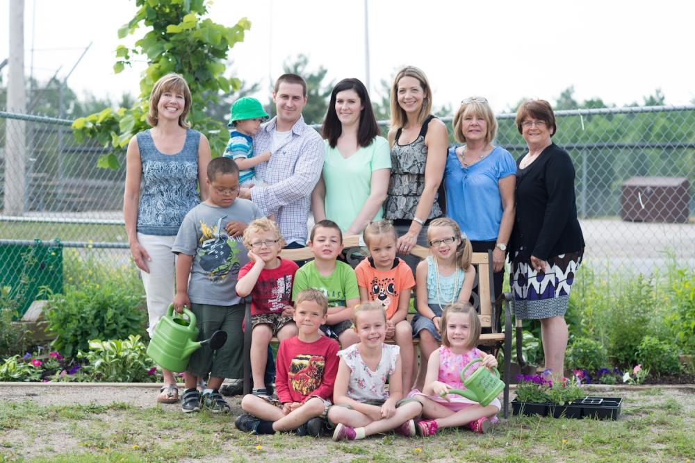 Classroom posing in butterfly garden