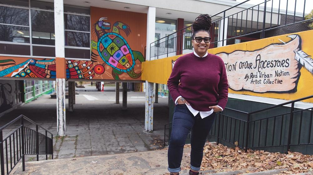 Tanitiã Munroe standing outside of school