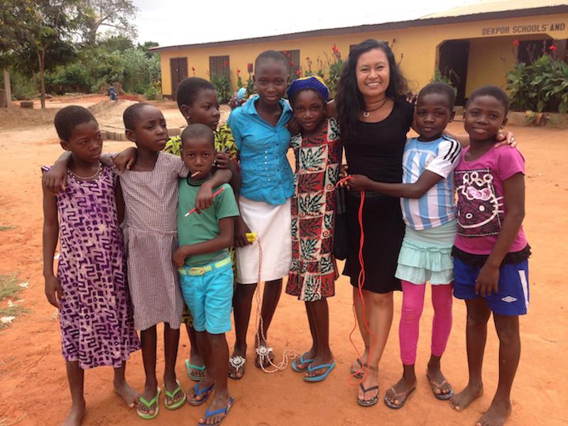 Teacher standing with Ghana students