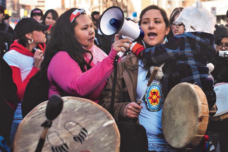 Indigenous activists organizing outside