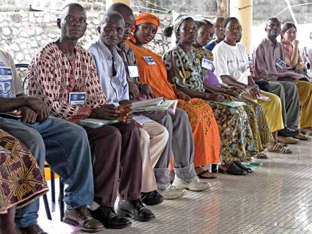 ugandan teachers sitting in line