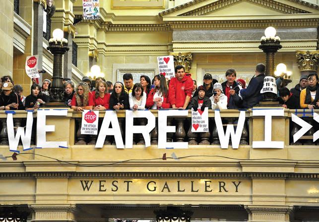 ETFO Members standing outside the front of West Gallery