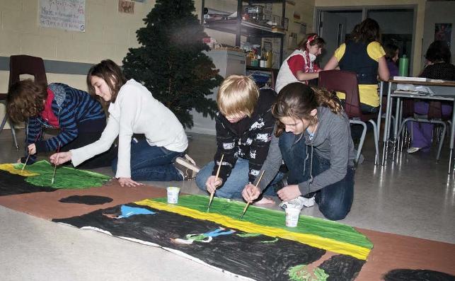 young students painting