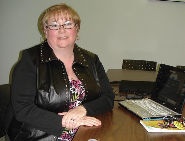 woman sitting at desk in office