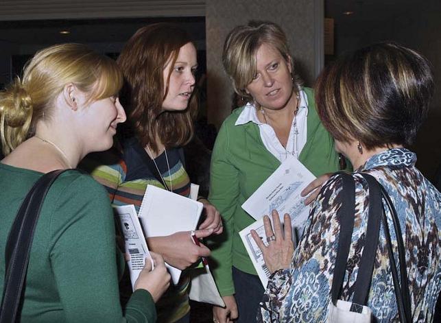 female etfo members standing together having a discussion