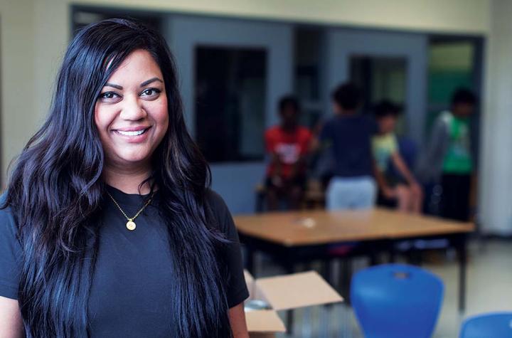Neema Patel posing in classroom