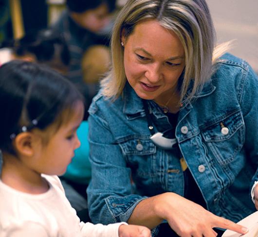 Cristol Bailey reading with student