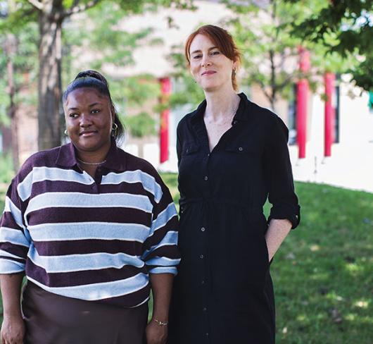 Meghan Mckee with Alison Symington posing together outside