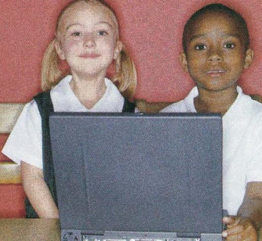kids sitting at laptop