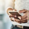 Stock image of person using a cellphone
